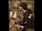 Man plays Kesariya on guitar for policemen.