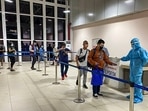 Passengers undergo thermal screening as random Covid-19 testing starts at various airports across the country in the wake of rising cases of Coronavirus globally. (PTI) Passengers undergo thermal screening as random Covid-19 testing starts at various airports across the country in the wake of rising cases of Coronavirus globally. (PTI)