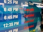 A board displays flight statuses after almost all of Southwest Airlines flights were cancelled at Oakland International Airport in Oakland, California, on Tuesday, Dec. 27, 2022. (Jessica Christian/San Francisco Chronicle via AP) A board displays flight statuses after almost all of Southwest Airlines flights were cancelled at Oakland International Airport in Oakland, California, on Tuesday, Dec. 27, 2022. (Jessica Christian/San Francisco Chronicle via AP)