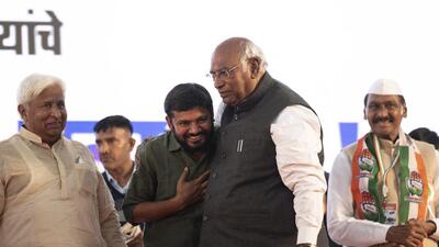 “The basic idea of India is being continuously attacked. The ditch of hatred is being dug across the country. People are suffering from inflation, unemployment, but the government is not concerned about it,” Kharge said, after he hoisted the flag at the party headquarters here to celebrate its 138th foundation day. (Satish Bate/ HT PHOTO)
