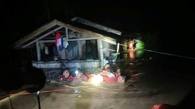 Philippine Coast Guard rescuers seen at work in Ozamiz City, Misamis Occidental on December 25. Sixteen of the 25 deaths were reported in Northern Mindanao region in the south, while 12 of the 26 missing are from the eastern Bicol region, AP reported. (Philippine Coast Guard / AFP) Philippine Coast Guard rescuers seen at work in Ozamiz City, Misamis Occidental on December 25. Sixteen of the 25 deaths were reported in Northern Mindanao region in the south, while 12 of the 26 missing are from the eastern Bicol region, AP reported. (Philippine Coast Guard / AFP)