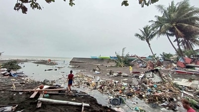Residents survey damage caused by heavy rain and floods in Oroquieta City, Misamis Occidental, on December 27. As of December 28, the effect of the shear line has weakened, and a new low-pressure area may bring moderate to heavy rains within the next 24 hours to the same areas affected by the Christmas weekend floods, AP reported. (Angelica Villarta / AFP) Residents survey damage caused by heavy rain and floods in Oroquieta City, Misamis Occidental, on December 27. As of December 28, the effect of the shear line has weakened, and a new low-pressure area may bring moderate to heavy rains within the next 24 hours to the same areas affected by the Christmas weekend floods, AP reported. (Angelica Villarta / AFP)