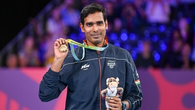 Sharath Kamal Achanta holds up his gold medal after defeating Liam Pitchford of England in the men's singles table tennis final at the Commonwealth Games in Birmingham (AP) Sharath Kamal Achanta holds up his gold medal after defeating Liam Pitchford of England in the men's singles table tennis final at the Commonwealth Games in Birmingham (AP)