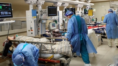 Covid In China: Medical workers attend to patients at the intensive care unit in China hospital. (Reuters)