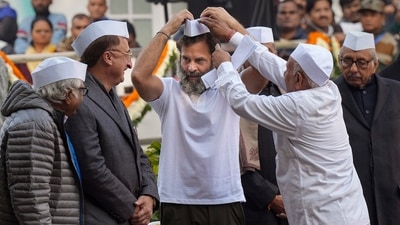 Congress leader Rahul Gandhi wears 'Gandhi topi', sporting a white t-shirt, during the party's 138th Foundation Day function, at AICC headquarters in New Delhi, Wednesday. (PTI Photo) Congress leader Rahul Gandhi wears 'Gandhi topi', sporting a white t-shirt, during the party's 138th Foundation Day function, at AICC headquarters in New Delhi, Wednesday. (PTI Photo)