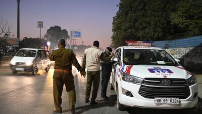 Police officers check vehicles at a checkpost on MG road near Iffco chowk flyover, ahead of New Year in Gurugram on Wednesday. (Parveen Kumar/HT Photo) Police officers check vehicles at a checkpost on MG road near Iffco chowk flyover, ahead of New Year in Gurugram on Wednesday. (Parveen Kumar/HT Photo)