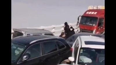 China Car Pileup: Many people were injured and trapped at the scene of the accident. China Car Pileup: Many people were injured and trapped at the scene of the accident.