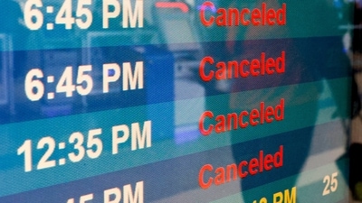 A board displays flight statuses after almost all of Southwest Airlines flights were cancelled at Oakland International Airport in Oakland, California, on Tuesday, Dec. 27, 2022. (Jessica Christian/San Francisco Chronicle via AP) A board displays flight statuses after almost all of Southwest Airlines flights were cancelled at Oakland International Airport in Oakland, California, on Tuesday, Dec. 27, 2022. (Jessica Christian/San Francisco Chronicle via AP)