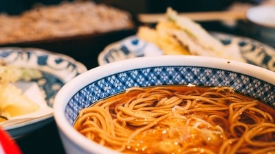 Soba Noodles, Japan: Eating soba noodles (buckwheat noodles) on new year's eve started as early as the 13th or 14th century. This is a well-established tradition that is said to bring good luck the entire year. (Unsplash) Soba Noodles, Japan: Eating soba noodles (buckwheat noodles) on new year's eve started as early as the 13th or 14th century. This is a well-established tradition that is said to bring good luck the entire year. (Unsplash)