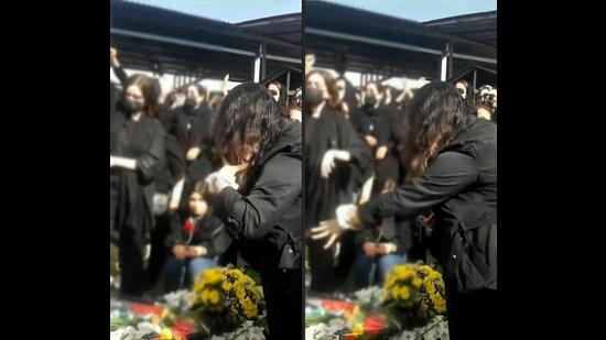 This combination, created on October 28, 2022, of image grabs from a UGC video released on October 27, shows a woman cutting her hair at the grave site of Nika Shahkarami in the city of Khorramabad, Iran, during a reported memorial held in honour of 40 days since the death of the 16-year-old. (AFP)
