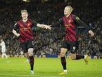 Manchester City's Erling Haaland, right, celebrates with teammate Kevin De Bruyne Manchester City's Erling Haaland, right, celebrates with teammate Kevin De Bruyne