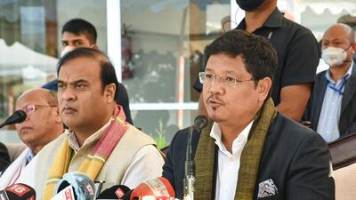 Assam chief minister Himanta Biswa Sarma and his Meghalaya counterpart, Conrad Sangma, signed an agreement in New Delhi for resolving their border dispute. (PTI) Assam chief minister Himanta Biswa Sarma and his Meghalaya counterpart, Conrad Sangma, signed an agreement in New Delhi for resolving their border dispute. (PTI)