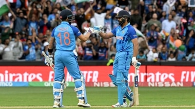 India's Rohit Sharma (R) and Virat Kohli bump gloves during the ICC men's Twenty20 World Cup 2022 semi-final cricket match between England and India at The Adelaide Oval on November 10, 2022 in Adelaide. (Photo by MICHAEL ERREY / AFP) / IMAGE RESTRICTED TO EDITORIAL USE - STRICTLY NO COMMERCIAL USE (AFP) India's Rohit Sharma (R) and Virat Kohli bump gloves during the ICC men's Twenty20 World Cup 2022 semi-final cricket match between England and India at The Adelaide Oval on November 10, 2022 in Adelaide. (Photo by MICHAEL ERREY / AFP) / IMAGE RESTRICTED TO EDITORIAL USE - STRICTLY NO COMMERCIAL USE (AFP)