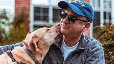 Dogs may lick their owners for a variety of reasons, and it's not always easy to determine why a particular dog is licking at a particular time (Pexels) Dogs may lick their owners for a variety of reasons, and it's not always easy to determine why a particular dog is licking at a particular time (Pexels)