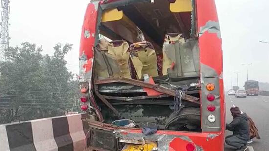 Mangled remains of the bus ferrying school students and (right) the truck in Khanna, Ludhiana. (HT Photo)