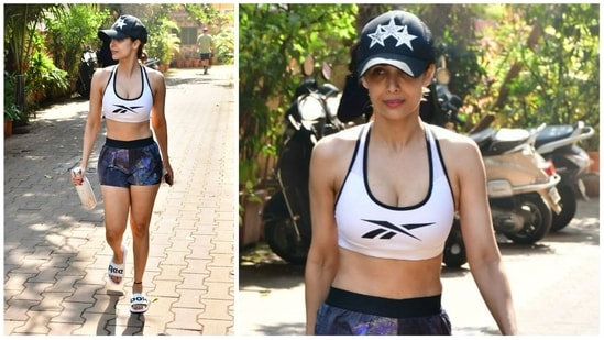Malaika Arora was seen at her yoga studio around Thursday noon. She was in athleisure wear and wore a cap as well. She is currently making headlines for her reality show, Moving In With Malaika. (Varinder Chawla)