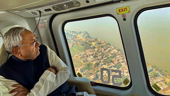 Bihar Chief Minister Nitish Kumar conducts an aerial survey of erosion in the River Ganga on Tuesday, Dec. 6, 2022.(PTI) Bihar Chief Minister Nitish Kumar conducts an aerial survey of erosion in the River Ganga on Tuesday, Dec. 6, 2022.(PTI)