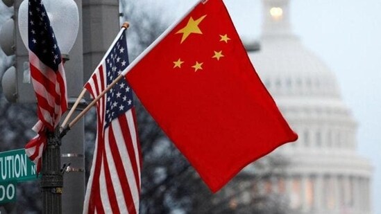The People's Republic of China flag and the US Stars and Stripes fly on a lamp post along Pennsylvania Avenue near the US Capitol in Washington, DC. (Representational image)(REUTERS )