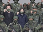 China-Taiwan Conflict: Taiwan President Tsai Ing-wen, center, poses with soldiers. China-Taiwan Conflict: Taiwan President Tsai Ing-wen, center, poses with soldiers.