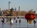 People skate on the frozen Houhai Lake in Beijing, China. China could see as many as 25,000 deaths a day from Covid-19 later in January, casting a shadow over the start of the first Lunar New Year festivities without pandemic restrictions. India, Spain, Malaysia add travel curbs on tourists from China as Covid-19 rises (Bloomberg) People skate on the frozen Houhai Lake in Beijing, China. China could see as many as 25,000 deaths a day from Covid-19 later in January, casting a shadow over the start of the first Lunar New Year festivities without pandemic restrictions. India, Spain, Malaysia add travel curbs on tourists from China as Covid-19 rises (Bloomberg)