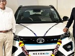 Tata Group chairman N Chandrasekaran (left) was delivered the 50,000th electric car produced by Tata Motors. Tata Group chairman N Chandrasekaran (left) was delivered the 50,000th electric car produced by Tata Motors.