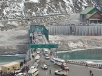 Vehicles seen outside the north portal of the Atal Tunnel in Himachal Pradesh on Monday. (HT Photo) Vehicles seen outside the north portal of the Atal Tunnel in Himachal Pradesh on Monday. (HT Photo)