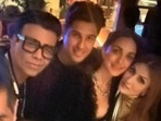 Sidharth Malhotra and Kiara Advani met Karan Johar and Neetu Kapoor at a party in Dubai. Sidharth Malhotra and Kiara Advani met Karan Johar and Neetu Kapoor at a party in Dubai.