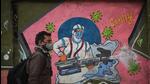 A man walks past a mural art of a health worker at New Delhi’s Rajendra Nagar. (HT photo) A man walks past a mural art of a health worker at New Delhi’s Rajendra Nagar. (HT photo)