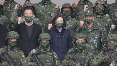 China-Taiwan Conflict: Taiwan President Tsai Ing-wen, center, poses with soldiers. (AP)