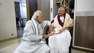 In this file photo, Prime Minister Narendra Modi meets his mother Heeraba on her 100th birthday, in Gandhinagar. (PTI) In this file photo, Prime Minister Narendra Modi meets his mother Heeraba on her 100th birthday, in Gandhinagar. (PTI)