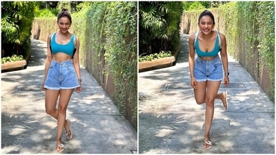 Rakul wore a light blue-coloured bralette and denim shorts for the holiday. While the top has a wide U neckline, broad straps and a cropped hem, the bottoms feature a high-rise waistline, side pockets and distressed hems. A messy top knot, a quirky silver backpack, hoop earrings, a layered chain, a metallic strap watch, rings, and strappy sandals rounded it all off. (Instagram) Rakul wore a light blue-coloured bralette and denim shorts for the holiday. While the top has a wide U neckline, broad straps and a cropped hem, the bottoms feature a high-rise waistline, side pockets and distressed hems. A messy top knot, a quirky silver backpack, hoop earrings, a layered chain, a metallic strap watch, rings, and strappy sandals rounded it all off. (Instagram)