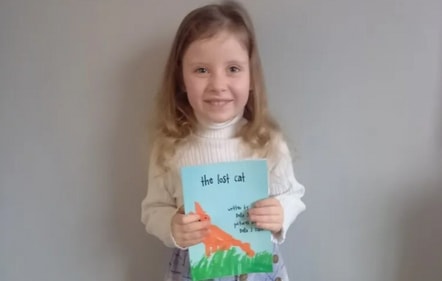 The little girl and her book that won her a Guinness World Record.&nbsp; (Guinness World Records)