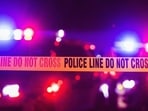 Accident or crime scene cordon tape, police line do not cross. It is nighttime, emergency lights of police cars flashing blue, red and white in the background (Getty Images/iStockphoto) Accident or crime scene cordon tape, police line do not cross. It is nighttime, emergency lights of police cars flashing blue, red and white in the background (Getty Images/iStockphoto)