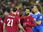 Liverpool's Mohamed Salah, second right, celebrates with teammates at the end of the English Premier League soccer match between Liverpool and Leicester City at Anfield stadium in Liverpool, England, Friday, Dec. 30, 2022. (AP Photo/Jon Super) Liverpool's Mohamed Salah, second right, celebrates with teammates at the end of the English Premier League soccer match between Liverpool and Leicester City at Anfield stadium in Liverpool, England, Friday, Dec. 30, 2022. (AP Photo/Jon Super)