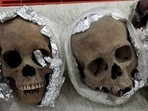 Four human skulls wrapped in plastic and aluminum foil are seen during an inspection by the National Guard inside a package bound for the United States at a courier company located at the Queretaro Intercontinental airport, in Queretaro, Mexico in this photo distributed on December 30.