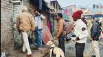 Police personnel along with a sniffer dog inspect the house of the accused Dildar Ansari (Agencies Photo)