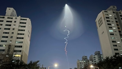 South Korea: The light trail is seen in Goyang, South Korea. (AP) South Korea: The light trail is seen in Goyang, South Korea. (AP)