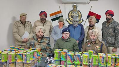 Accused in the custody of Ludhiana police with 370 spools of banned kite string. (HT PHOTO)
