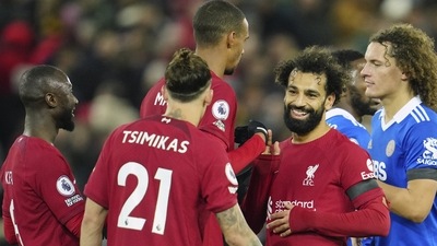 Liverpool's Mohamed Salah, second right, celebrates with teammates at the end of the English Premier League soccer match between Liverpool and Leicester City at Anfield stadium in Liverpool, England, Friday, Dec. 30, 2022. (AP Photo/Jon Super) (AP) Liverpool's Mohamed Salah, second right, celebrates with teammates at the end of the English Premier League soccer match between Liverpool and Leicester City at Anfield stadium in Liverpool, England, Friday, Dec. 30, 2022. (AP Photo/Jon Super) (AP)