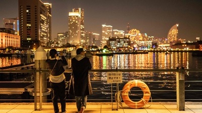 A couple visit a park in Yokohama. New Year 2023 travel alert: Japan's Yokohama introduces Ramen Museum (Photo by Yuichi YAMAZAKI / AFP) A couple visit a park in Yokohama. New Year 2023 travel alert: Japan's Yokohama introduces Ramen Museum (Photo by Yuichi YAMAZAKI / AFP)