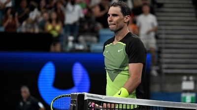 Rafael Nadal of Spain leaves after his defeat against Britain's Cameron Norrie during their men's singles match on day three of the United Cup tennis tournament in Sydney on December 31, 2022. (Photo by Saeed KHAN / AFP) / -- IMAGE RESTRICTED TO EDITORIAL USE - STRICTLY NO COMMERCIAL USE -- (AFP) Rafael Nadal of Spain leaves after his defeat against Britain's Cameron Norrie during their men's singles match on day three of the United Cup tennis tournament in Sydney on December 31, 2022. (Photo by Saeed KHAN / AFP) / -- IMAGE RESTRICTED TO EDITORIAL USE - STRICTLY NO COMMERCIAL USE -- (AFP)