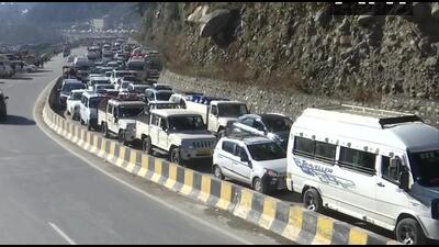 Vehicles making a beeline for Manali in Himachal Pradesh on Saturday. Tourists are headed for Rohtang Tunnel and Manali after strict traffic curbs enforced in Shimla. (ANI Photo) Vehicles making a beeline for Manali in Himachal Pradesh on Saturday. Tourists are headed for Rohtang Tunnel and Manali after strict traffic curbs enforced in Shimla. (ANI Photo)