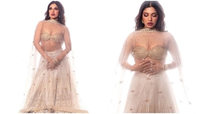 On Friday, Bhumi Pednekar took to Instagram to share pictures from the photoshoot with the caption, "Golden Dream." The actor's lehenga set in the clicks is from the shelves of the designer label Shantnu And Nikhil, and celebrity stylist Manisha Melwani styled the look. It features an embellished bralette, heavily-embroidered lehenga and zari dupatta. (Instagram) On Friday, Bhumi Pednekar took to Instagram to share pictures from the photoshoot with the caption, "Golden Dream." The actor's lehenga set in the clicks is from the shelves of the designer label Shantnu And Nikhil, and celebrity stylist Manisha Melwani styled the look. It features an embellished bralette, heavily-embroidered lehenga and zari dupatta. (Instagram)