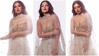 Bhumi skipped on heavy jewellery to style the ethnic ensemble. She wore ornate gold bracelets and bangles, statement rings and matching dangling earrings. In the end, Bhumi chose centre-parted wavy tresses, shimmering pink and gold eye shadow, winged eyeliner, mascara on the lashes, darkened brows, berry-toned lip shade, rouged cheeks, and glowing base for the glam picks. (Instagram) Bhumi skipped on heavy jewellery to style the ethnic ensemble. She wore ornate gold bracelets and bangles, statement rings and matching dangling earrings. In the end, Bhumi chose centre-parted wavy tresses, shimmering pink and gold eye shadow, winged eyeliner, mascara on the lashes, darkened brows, berry-toned lip shade, rouged cheeks, and glowing base for the glam picks. (Instagram)