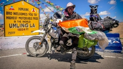 Chow Sureng Rajkonwar with his pet dog Bella at world's highest motorable road in Ladakh. (Instagram/@one_crazy_guy) Chow Sureng Rajkonwar with his pet dog Bella at world's highest motorable road in Ladakh. (Instagram/@one_crazy_guy)