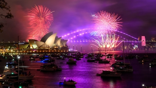 New Year 2023 In Australia: Early fireworks explode over Sydney Opera House.(Reuters)