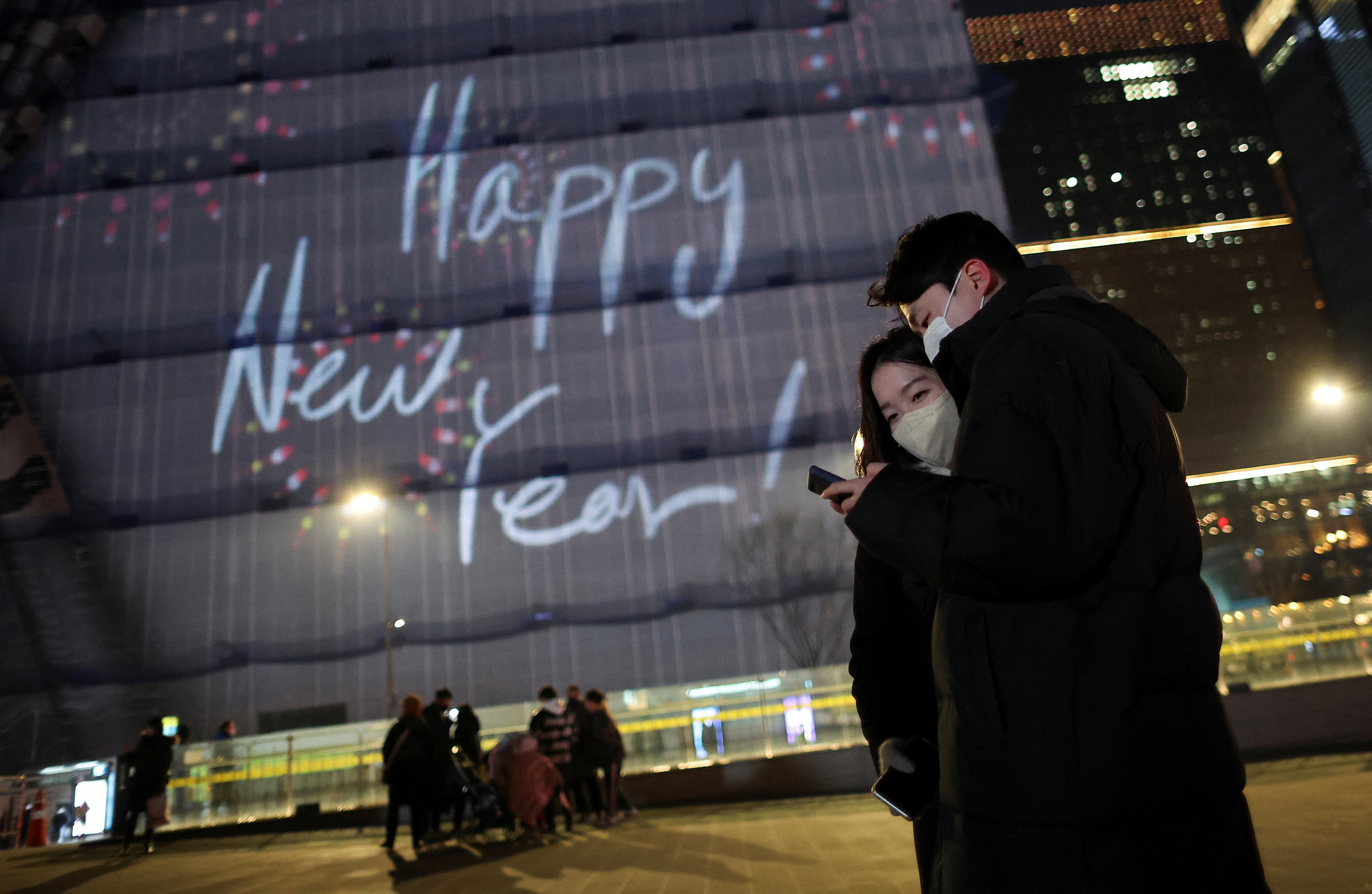 People celebrate New Year's eve in central Seoul, South Korea. (Reuters)