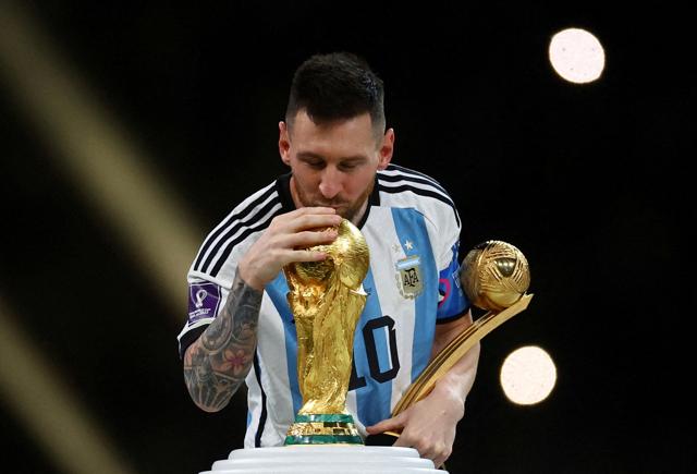 Lionel Messi with the World Cup Trophy, FIFA World Cup, Qatar, 2022. (Photo: Kai Pfaffenbach/ REUTERS) Lionel Messi with the World Cup Trophy, FIFA World Cup, Qatar, 2022. (Photo: Kai Pfaffenbach/ REUTERS)