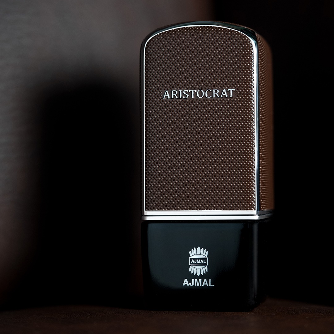 This sophisticated aromatic-citrus perfume is refreshing with bergamot, lemon, and a generous presence of marine notes. The base of tonka beans, vanilla, amber, and cedarwood gives a distinct woody trail to the fragrance. (Aristocrat by Ajmal) This sophisticated aromatic-citrus perfume is refreshing with bergamot, lemon, and a generous presence of marine notes. The base of tonka beans, vanilla, amber, and cedarwood gives a distinct woody trail to the fragrance. (Aristocrat by Ajmal)