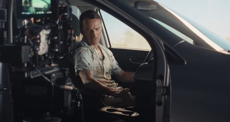 Behind the scenes image of Michael Fassbender from The Killer. Behind the scenes image of Michael Fassbender from The Killer.